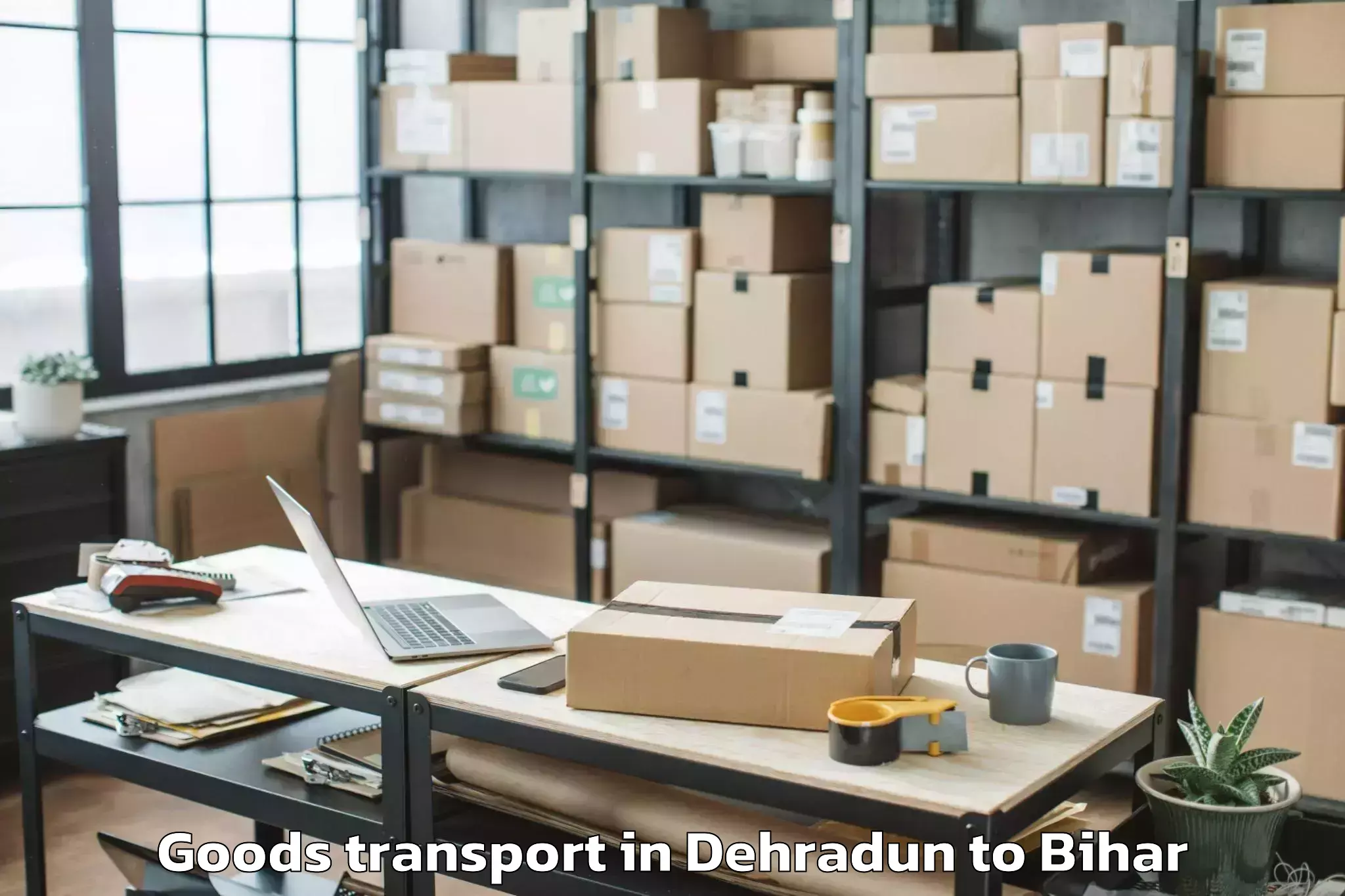 Professional Dehradun to Makhdumpur Goods Transport